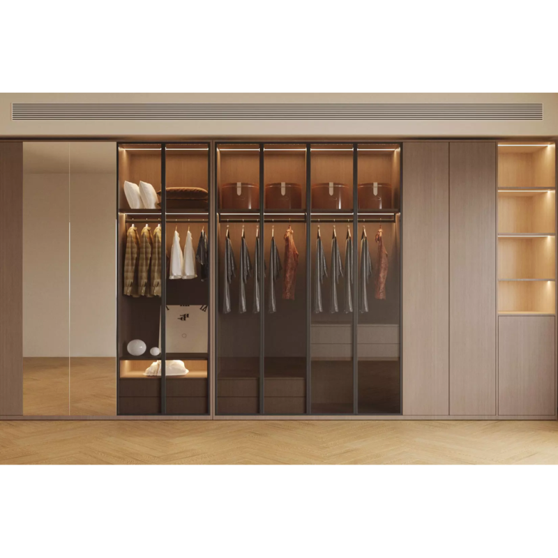 Luxury glass sliding door wardrobe in warm oak with matt black aluminium frame and LED lighting in Dubai villa bedroom