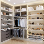 Luxury walk-in closet system in warm white and graphite with LED shoe tower in Dubai villa